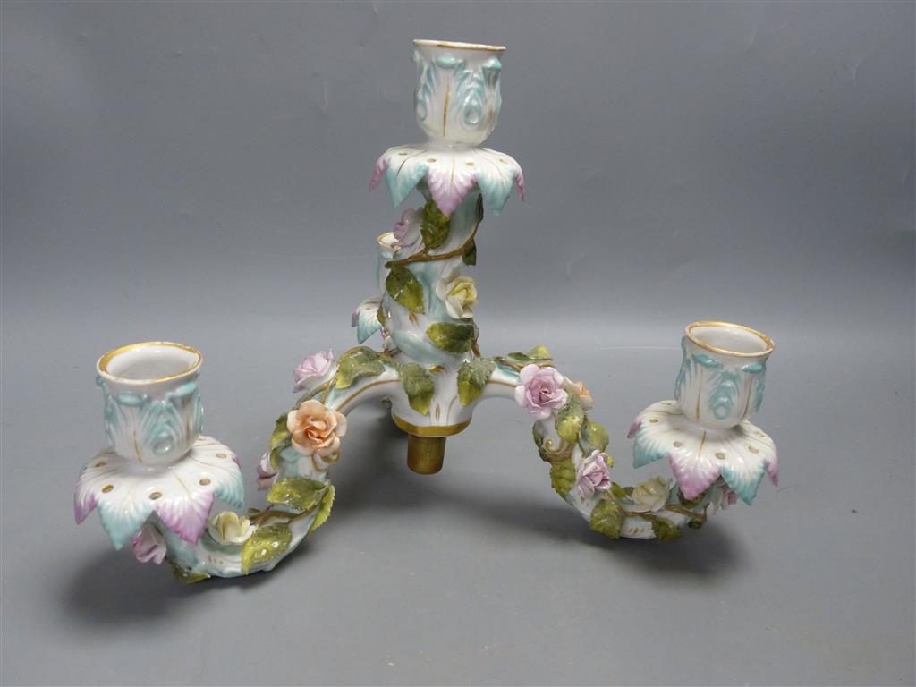 A pair of early 20th century Plaue porcelain figural candelabra, overall height 48cm